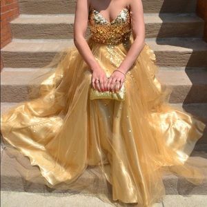 Gold sparkly prom dress from Peaches boutique